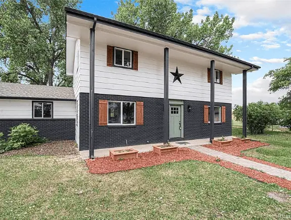 Side angle of Denver house that was purchased quickly with cash